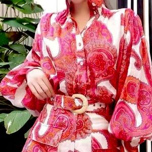 Set of blouse and shorts.